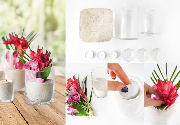 Ordna sommardekorationer med blommor och sand i glas