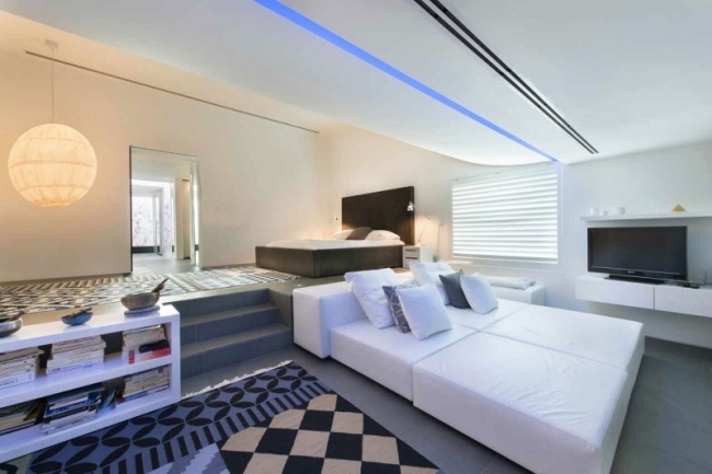 Modernt sovrum-golvmatta modern-vita sängkläder