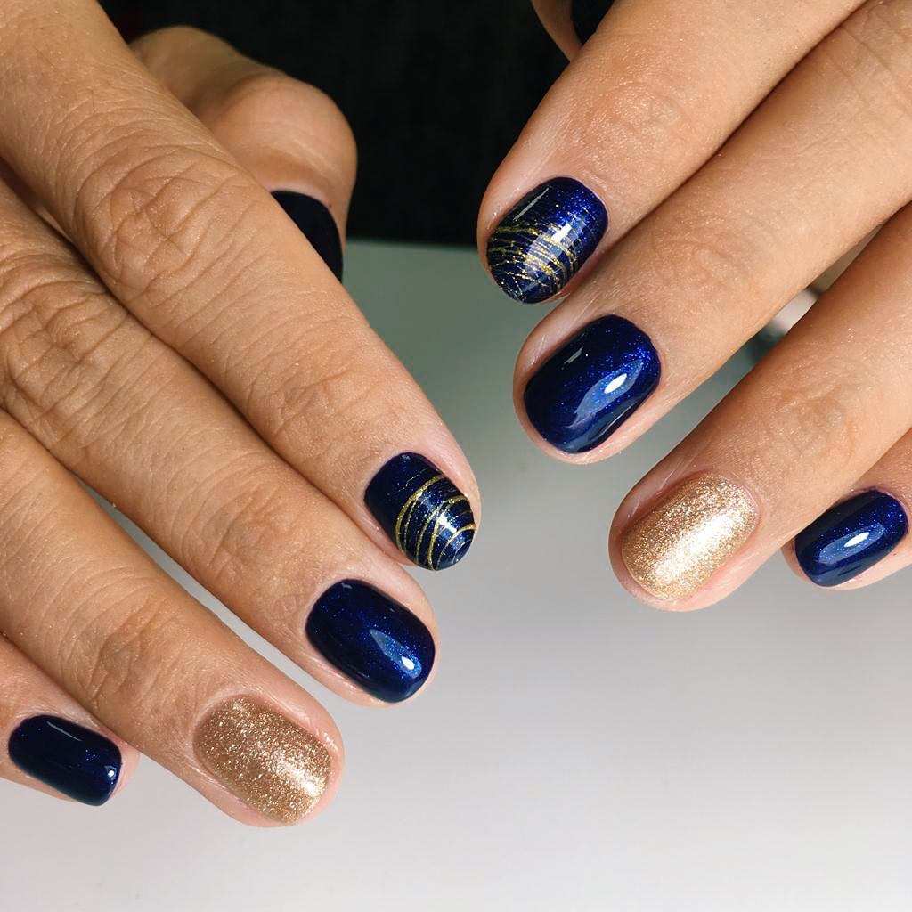Spider gel naglar kort glitter guld nagellack mörkblå nageltrender sommaren 2019