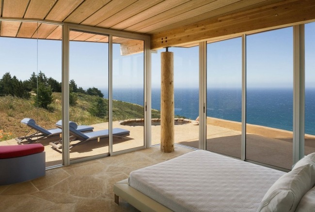 sovrum design glasväggar havsutsikt uteplats tillgång