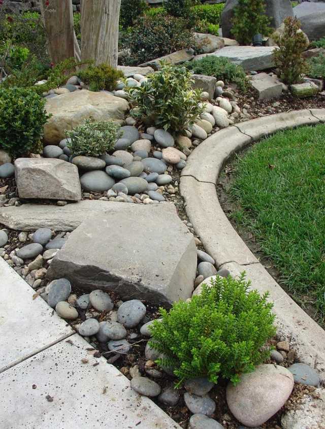 sten trädgård stenblock gräsmatta landskap design