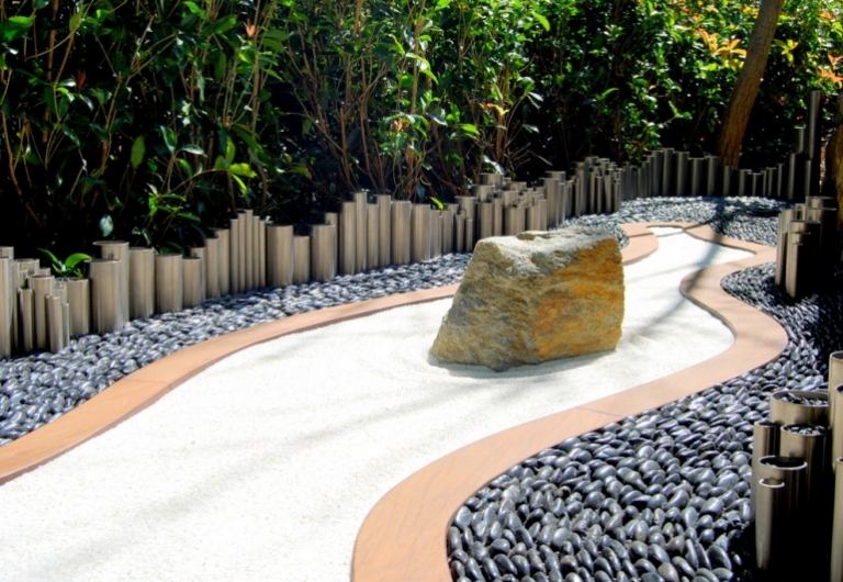 Skapa rock garden moderna idéer-sand-flod stenar-syenit