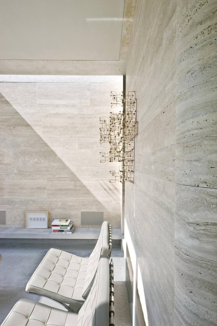 stenbeklädnad vägg kalksten ljus förekomst av ljus betonggolv minimalistisk