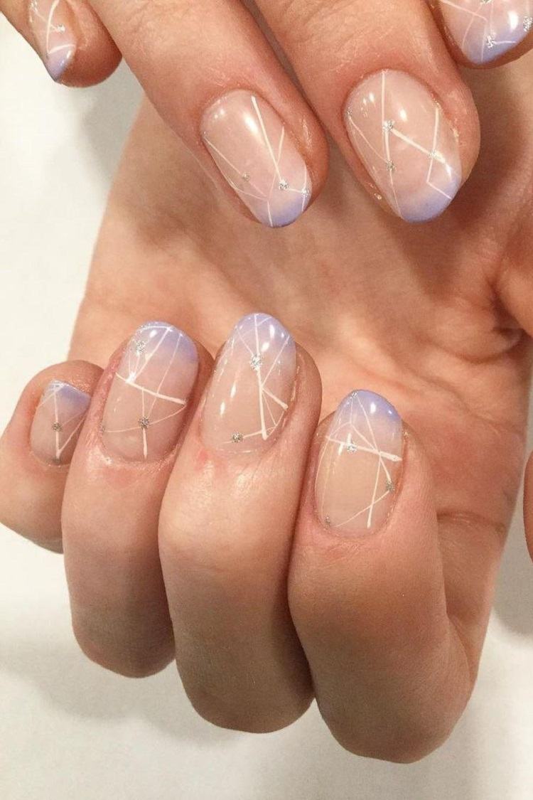 Naken gel naglar design spik trender våren konstellation naglar