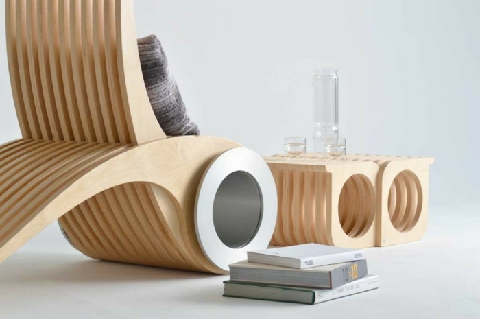 stol design exocet soffbord trä böcker kuddar