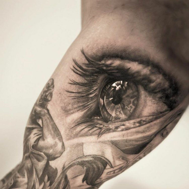 Tatuering överarm män öga ansikte kvinna