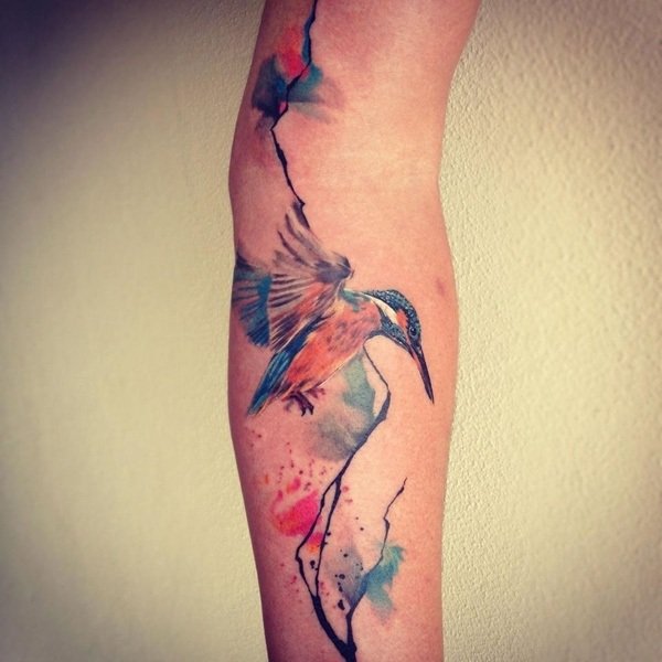 underarm tatuering motiv kolibri akvarell effekt