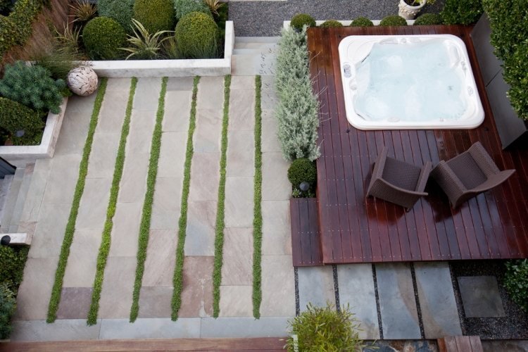idéer-terrass-design-bilder-bubbelpool-sten-terrass-platta-gräs-remsor