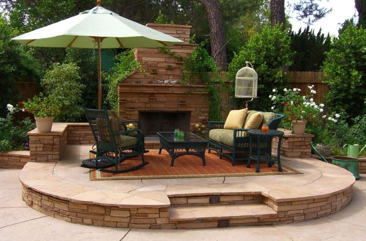 terrass design-inredning-natursten-utomhus-öppen spis-matta-sittgrupp