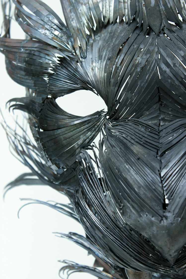 djurskulpturer metall svart märke tiger eye metal strips