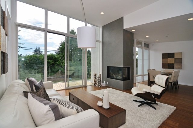 modern-design-tips-vardagsrum-öppen spis-inbyggd-i-vägg-gips-grå
