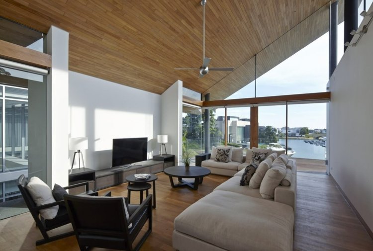 bordsskiva-träd-stam-design-sluttande tak-lounge-lowboard-vägg-enhet-soffa-grädde färg