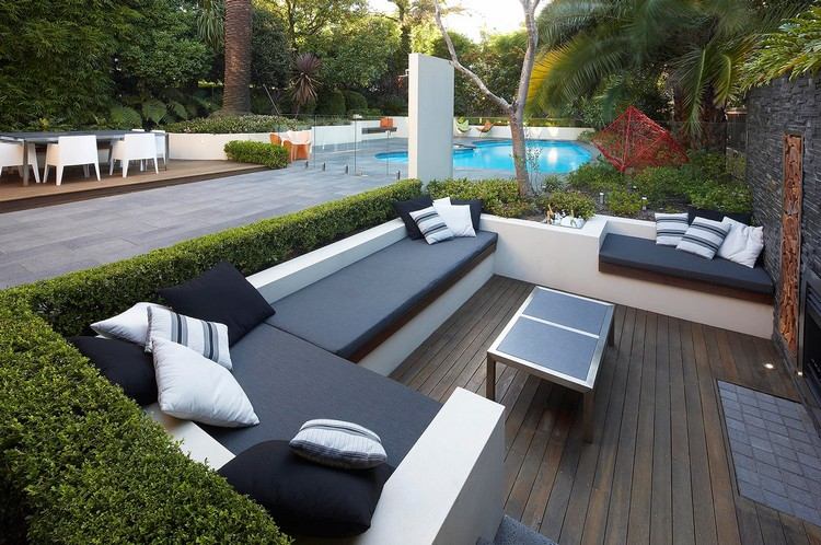trädgård-lounge-set-design-idéer-tegel-bänk-häck-gräns