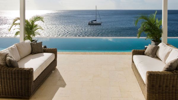 Infinity pool utomhuspool Hotel-St Lucia Bay utsikt-terrass soffa-sits-rotting