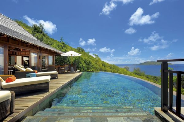 Hotell-pooler Design Infinity-med en VIEW-Seychellerna-Villa traditionell