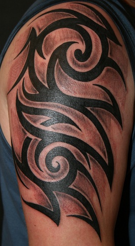 Tribal Flame Style Arm Tattoo