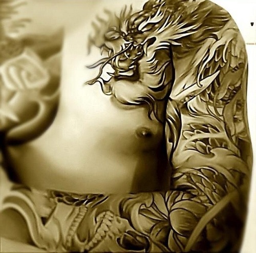 Tribal Dragon Design Arm Tattoo