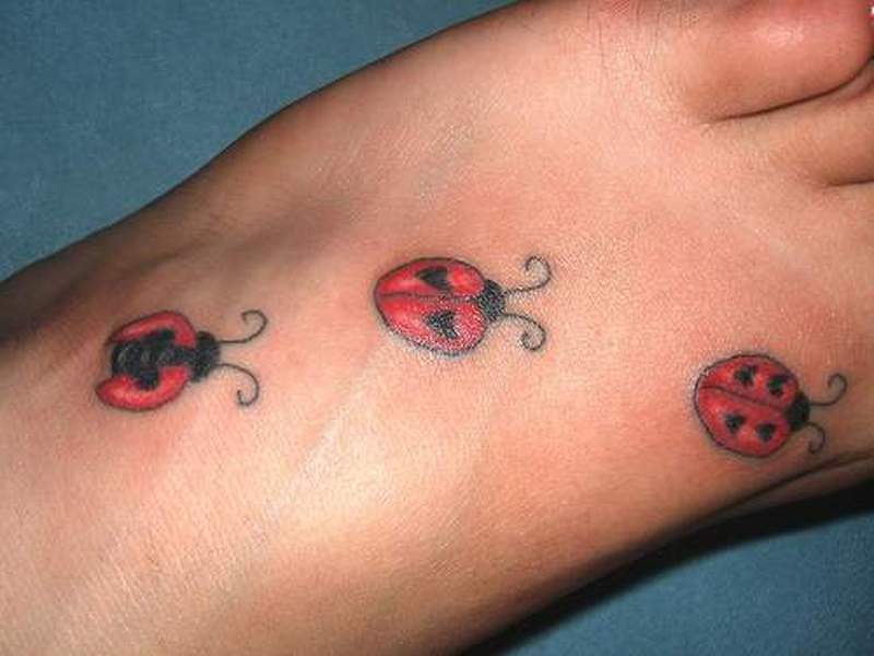 Lady Bug Tattoo mallit ja merkitykset