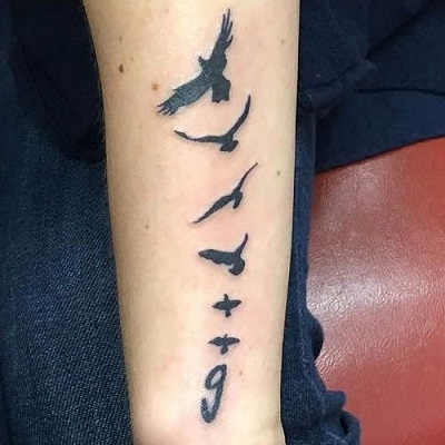 Κοπάδι πουλιών Μνημείο τατουάζ