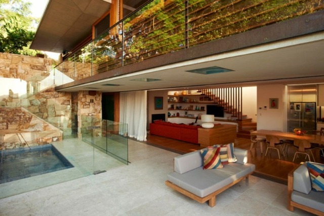 Australien modernt fasad vardagsrum skjutbar glasdörr pool
