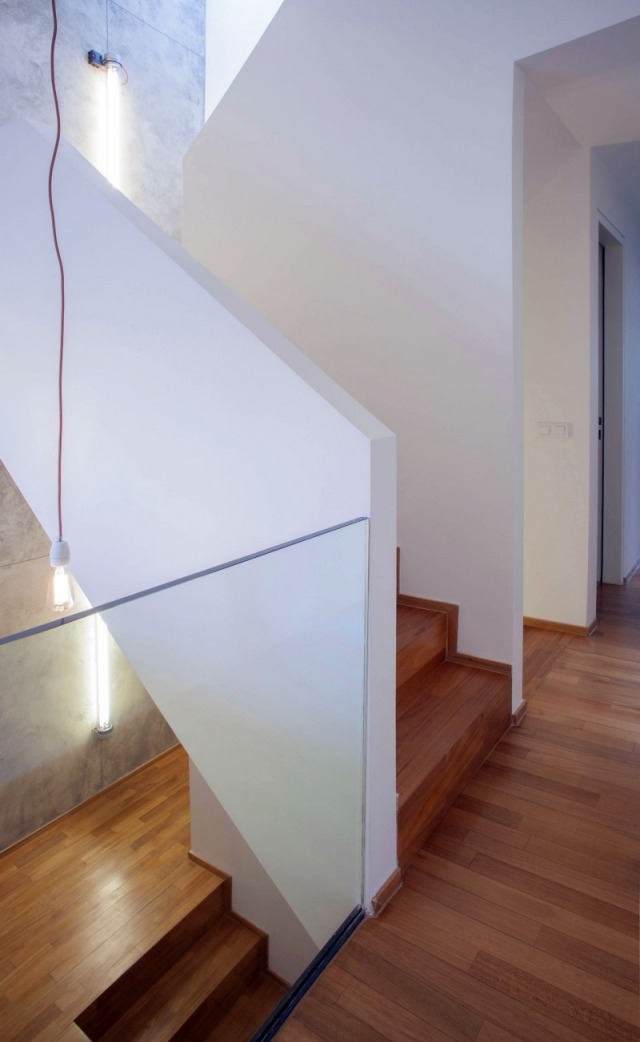 triplex lägenhet konvertering glasräcke trägolv