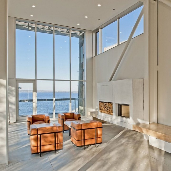 Familjehus design-golv till tak glas vägg-inomhus spis-läder stoppad fåtölj sittgrupp