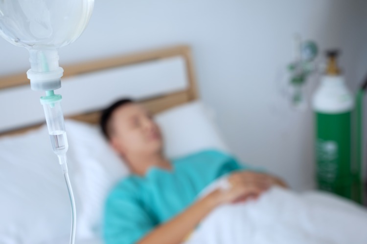Patient på sjukhus på kemoterapi för cancer
