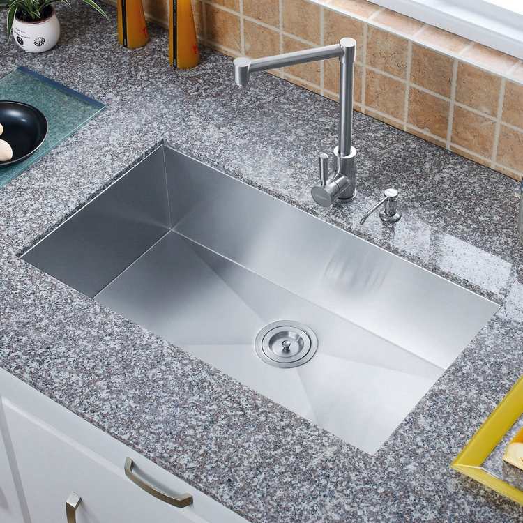 bänkskiva i marmor med undermonterat handfat i rostfritt stål för modern design i köket