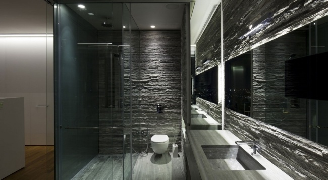 R1T penthouse badrumsdesign natursten grå