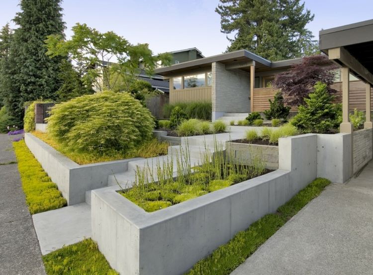Exempel på trädgårdsdesign exempel bilder upphöjda sängar betong gräs kuddar