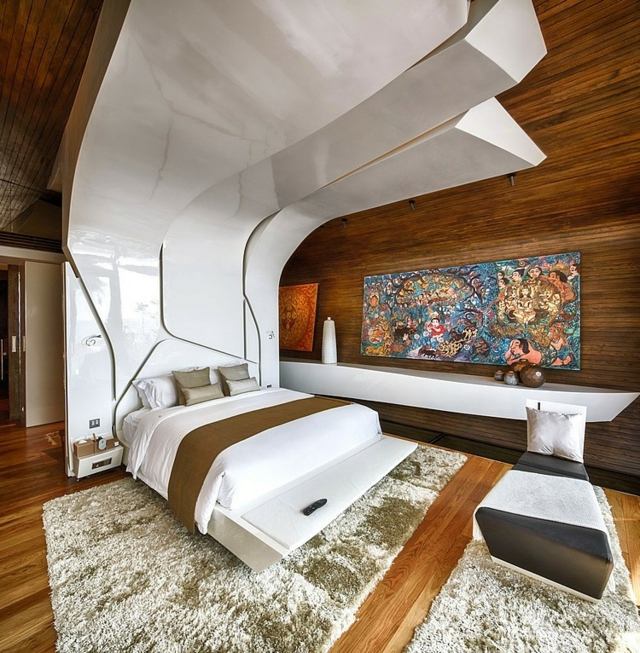Sovrum-vägg-design-trä-paneler-överdimensionerade-säng-sänggavel