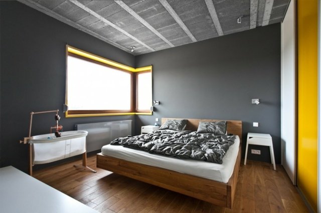 grå väggfärg laminatgolv dubbelsäng