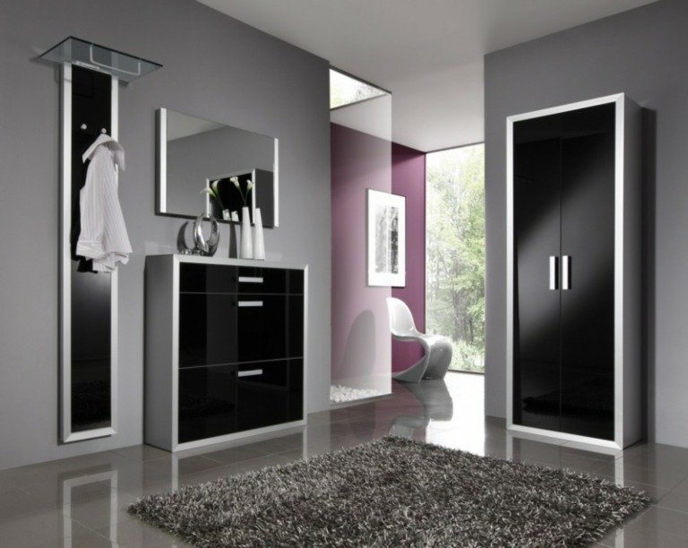 Väggmonterad garderob-design-svart-glas-hall möbeldesigner