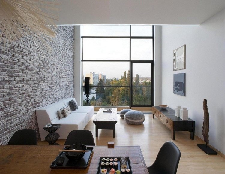 väggdesign-vardagsrum-tegel-vägg-optik-vit-soffa