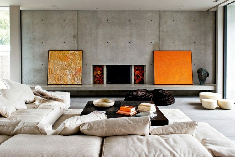 väggdesign i betonglook accent vägg-lowboard-konsol-grädde-soffa