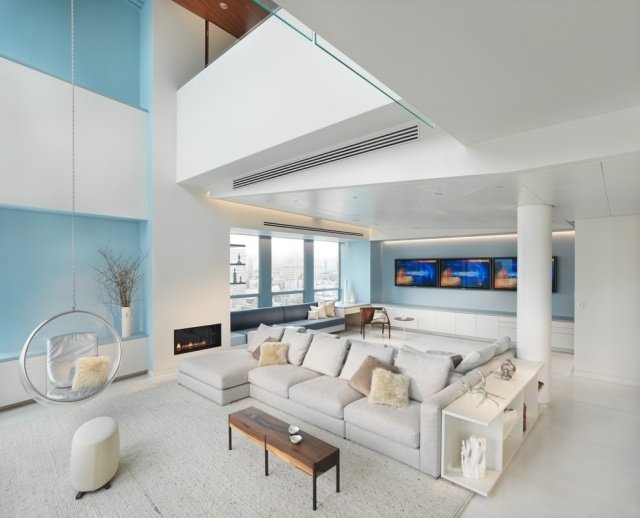 modernt-vardagsrum-öppet-utrymme-design-blå-väggar-kyl-effekt