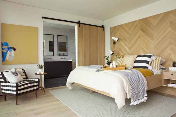 ljus trä accent vägg säng skjutdörr vägg design med fiskbensmönster