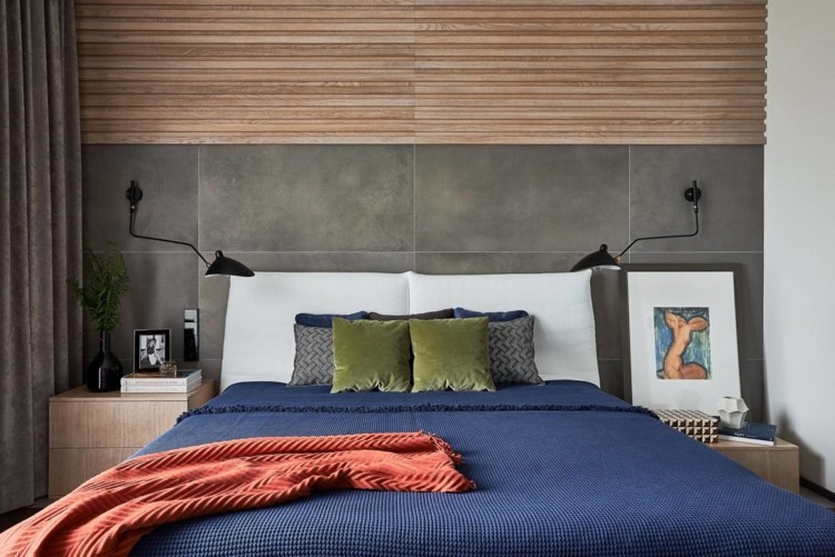 varma färger sovrum grå väggpanel trä säng