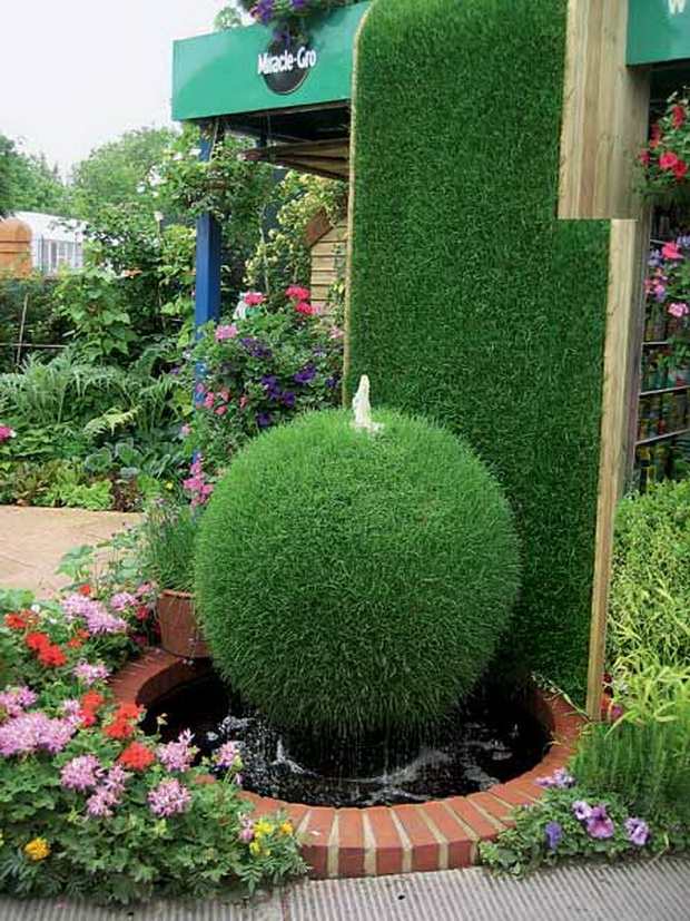 Idéer för moderna vattenfunktioner i trädgården Bollfontän grön