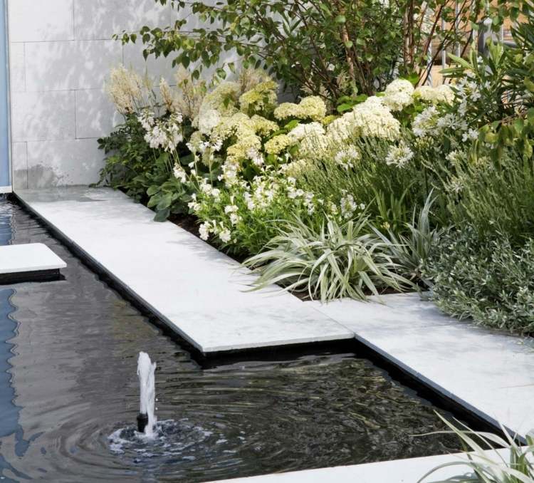 Vattenspel-trädgård-fontän-bassäng-betong-idéer
