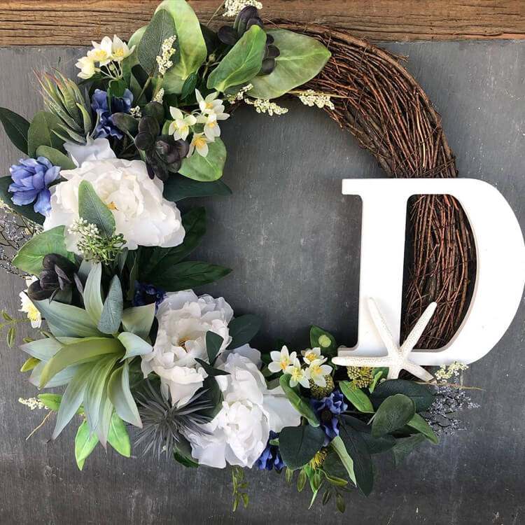Willow krans dekorera våren idéer med färska blommor