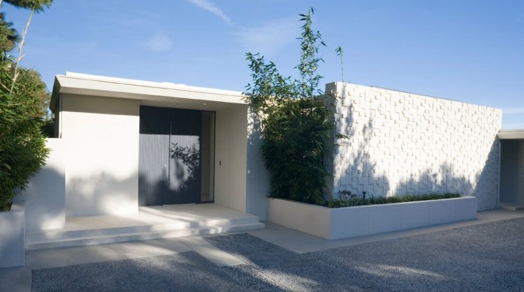 vägg-betong-block-trousdale-hus-design-upphöjd säng-entré