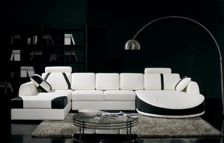 vitt-vardagsrum-möbler-modern-soffa-bäddsoffa-golvlampa-arco-flos-1962