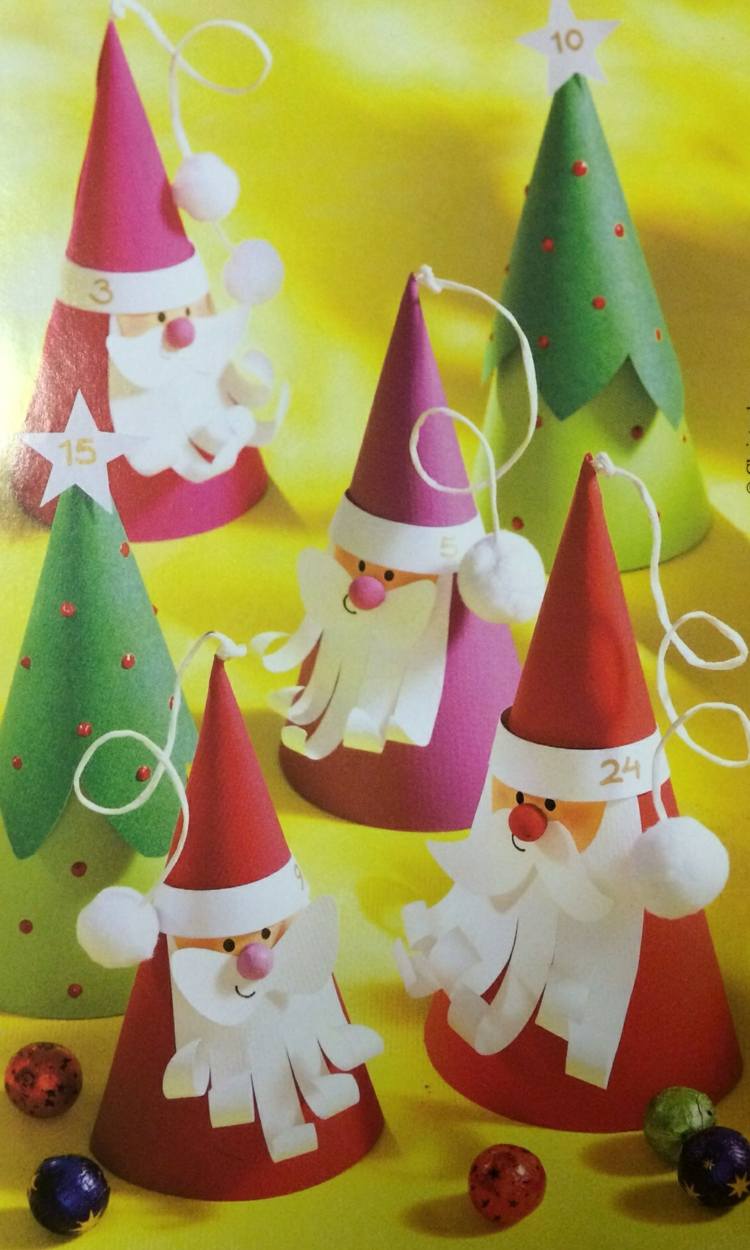 julpyssel med barn konpapper jultomten färgglada