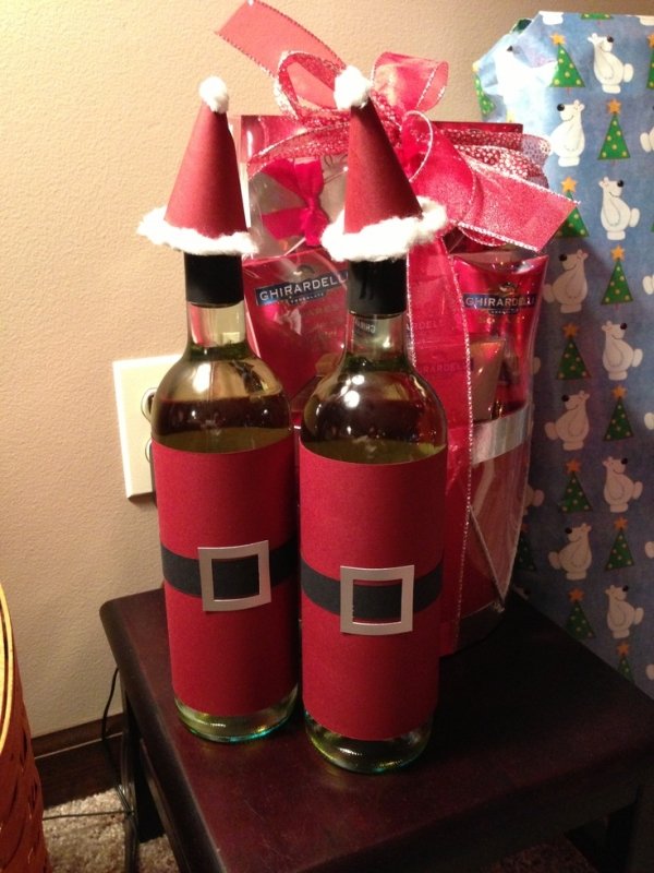 vinflaskor julförpackning papper röd jultomte kostym