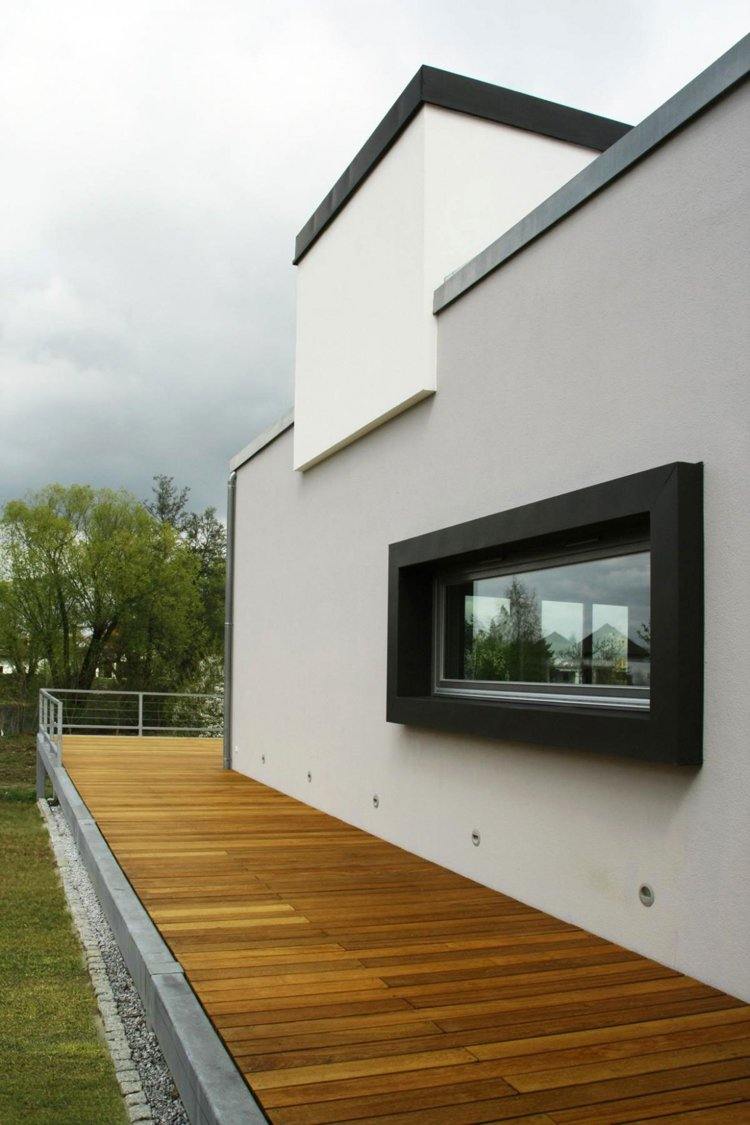 vilken-trä-terrass-tips-modern-arkitektur-gräsmatta-grus-trädgård stig