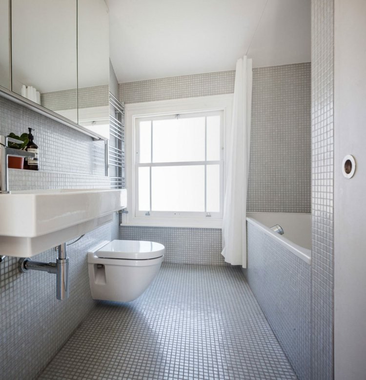 vinterträdgård-vardagsrum-badrum-design-monokrom-mosaik-grå-badkar