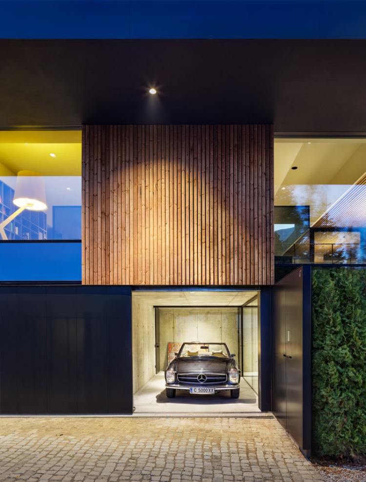glas-vägg-utanför-ljus-platt-tak-hus-garage-modern-arkitektur