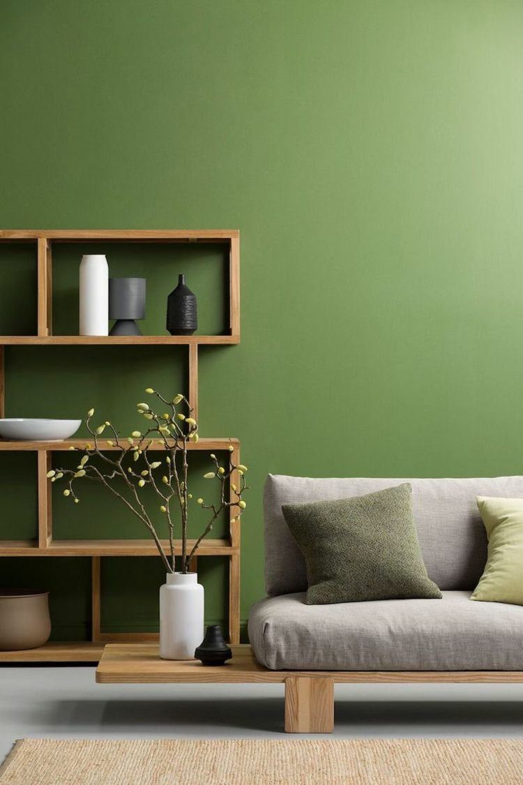 designväggar olivgrön modern vägghylla soffa minimalistisk skandinavisk