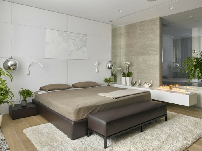 sovrum design brun möbler säng matta sten kakel vägg